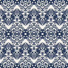 Indigo dye woodblock printed seamless ethnic floral damask pattern. Traditional oriental ornament of India with exotic flowers of Kashmir, navy blue on ecru background. Textile design.
