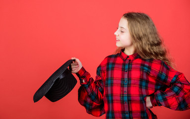 Girl artistic kid practicing acting skills with black hat. Enter acting academy. Acting school for...