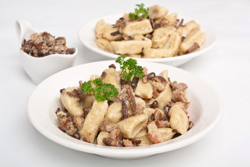gnocchi with sausage and porcini mushrooms sauce