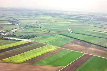 View from the window of the plane to the suburbs during the descent of the aircraft