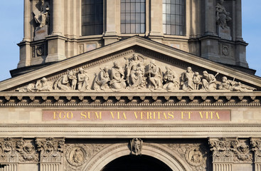 Fototapeta na wymiar Tympanum bass relief showing the Virgin Mary and Hungarian saints, St. Stephen`s Basilica in Budapest, Hungary