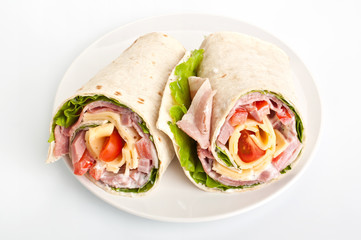 wrapped tortilla sandwich rolls cut in half