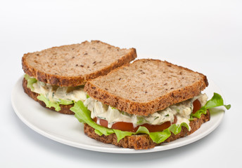 egg salad sandwiches on brown toasted bread
