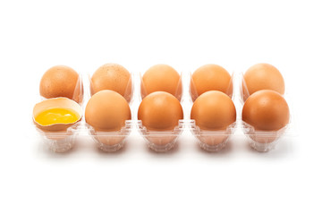 An eggs packaging with one egg crack on left