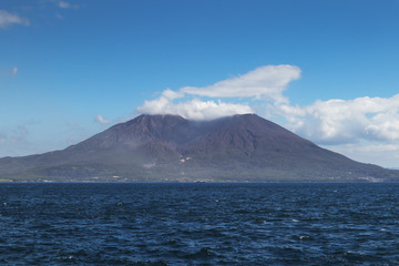 View of the Sakurajima (cherry blossom island), an active volcano seen from Kagoshima hotel        