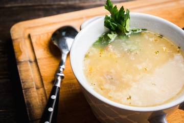 Fat meat soup with lamb based broth, chickpea and potatoes. Selective focus.