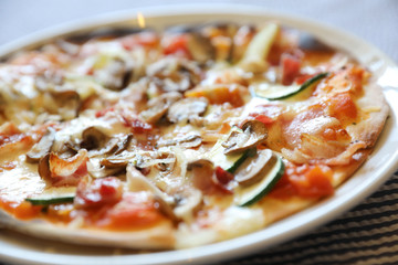 Pizza with bacon and mushroom , italian food