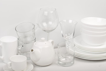 Fototapeta na wymiar Set of white dishes . table wear