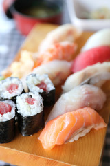 Sushi Set nigiri and sushi maki with tea served on wood and soup , Japanese food