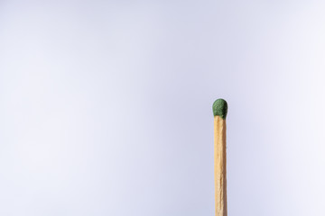 Wooden match tip isolated on white background. 