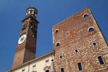 Torre dei Lamberti - medieval tower of the Lamberti XI century - 84 m. Piazza delle Erbe, UNESCO world heritage site  in Verona, Italy