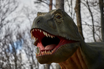 Portrait of dinosaur on nature background