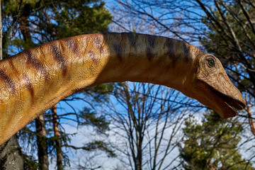 Portrait of dinosaur on nature background