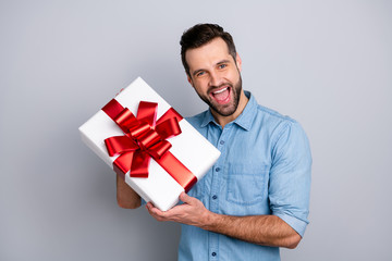 Close up photo amazing he him his guy romance surprise hold big large gift box scream shout yell girlfriend best boyfriend wear casual jeans denim shirts outfit clothes isolated grey background