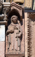 Saint Anastasia, statue on Facade of Sant`Anastasia Church in Verona, Italy