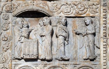 Presentation of Jesus in the Temple and angel appeared to Joseph in a dream to tell him to flee to Egypt, medieval relief on the facade of Basilica of San Zeno in Verona