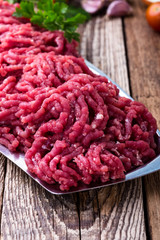 Minced beef, raw ground meat with cooking ingredients