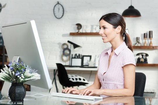 Young woman working with computer