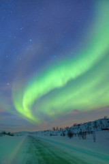 Northern lights in the sky over Tromso, Norway 