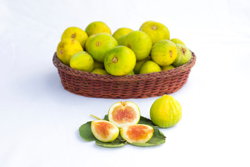 grenn figs opened closeup on white background.