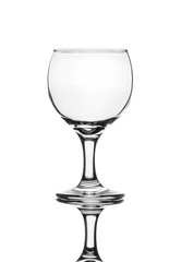A single empty wine glass isolated on a white background with reflection. High contrast black and white, black line lighting.