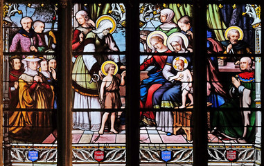 St. John the Baptist introduced by his mother, St. Elizabeth, the Infant Jesus and the Holy Kinship, stained glass window in Saint Severin church in Paris, France