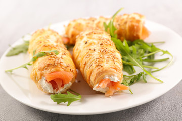 puff pastry roll with cheese cream and smoked salmon