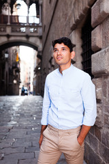 man posing in gothic quarter of Barcelona