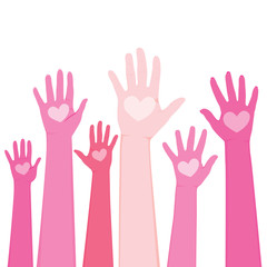 Raised up human hands in different shades of pink and heart on palm international volunteer day concept