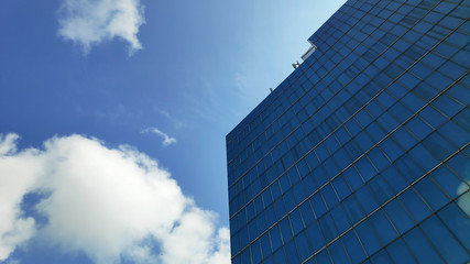 Fototapeta na wymiar Modern office building and blue sky