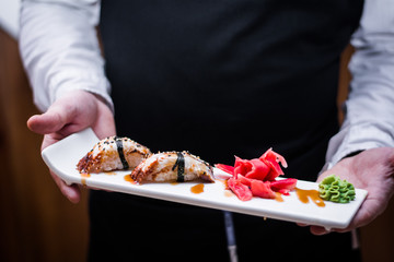 sushi dish food at a restaurant rice with seafood