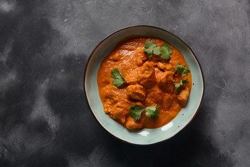 Chiken Tikka Masala - traditional Indian/British dish. Chicken with curry, turmeric. Indian dinner concept. Asian, Indian food