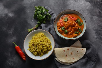 Chiken Tikka Masala - traditional Indian/British dish. Chicken with curry, turmeric. Indian dinner concept. Asian, Indian food
