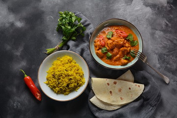 Chiken Tikka Masala - traditional Indian/British dish. Chicken with curry, turmeric. Indian dinner concept. Asian, Indian food