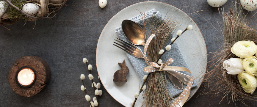 Easter place setting on dark table plate