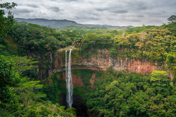 Fototapeta na wymiar beautiful close view of chamarel waterfall, mauritius on a cloudy day