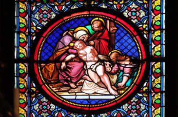 Lamentation of Christ, stained glass window in the Basilica of Saint Clotilde in Paris, France