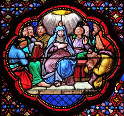 Fototapeta na wymiar Descent of Holy Spirit, Pentecost , stained glass window in the Basilica of Saint Clotilde in Paris, France 