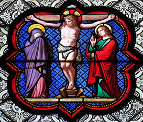 Crucifixion, stained glass window in the Basilica of Saint Clotilde in Paris, France 