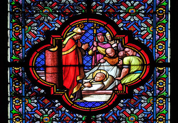 Burying of Saint Remi, stained glass window in the Basilica of Saint Clotilde in Paris, France