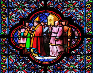 Fototapeta premium Transfer of Saint Remi relics, stained glass window in the Basilica of Saint Clotilde in Paris, France 