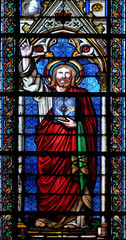 Christ blessing, stained glass window in the Basilica of Saint Clotilde in Paris, France