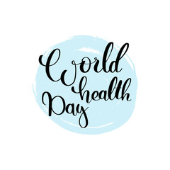 Obraz premium Vector hand lettering illustration. World health day - calligraphy phrase with blue ink spot. Design composition with typography elements