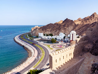 Panoramic view of the city Muscat capital of Oman and the coast of the Gulf of Oman from Fort Muttrah - obrazy, fototapety, plakaty