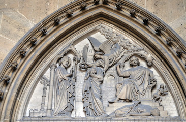 Bass relief on the portal of the Basilica of Saint Clotilde in Paris, France