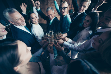 Obraz premium Close up top above high angle photo business people different age race she her he him his excited amazed company hands arms raised up golden wine friendship friends formal wear jackets shirts