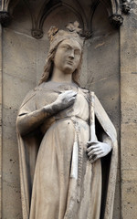 Statue of Saint on the portal of the Basilica of Saint Clotilde in Paris, France 