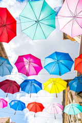 multicolored umbrellas in le caudan waterfront, port louis capital of mauritius