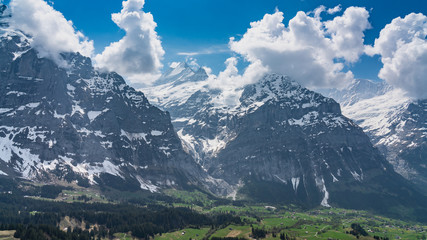 Switzerland, panoramic view on snow Alps with clouds