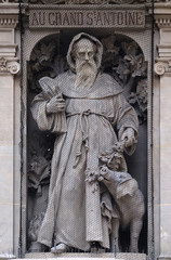 Saint Anthony the Great, statue near the Porte Saint Denis in the 10th arrondissement in Paris, France 